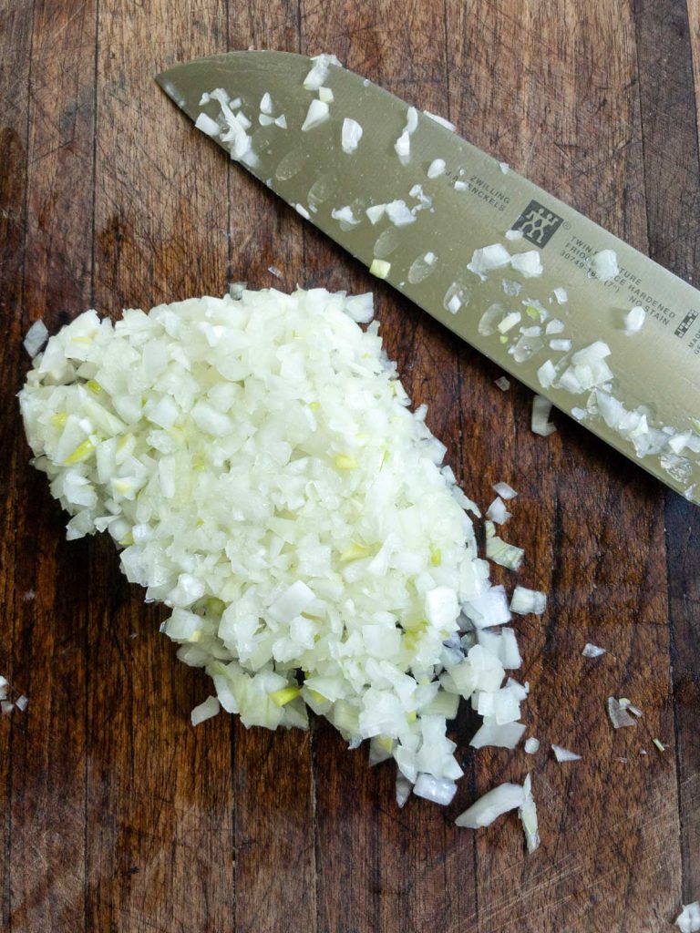 Diced onions on cutting board
